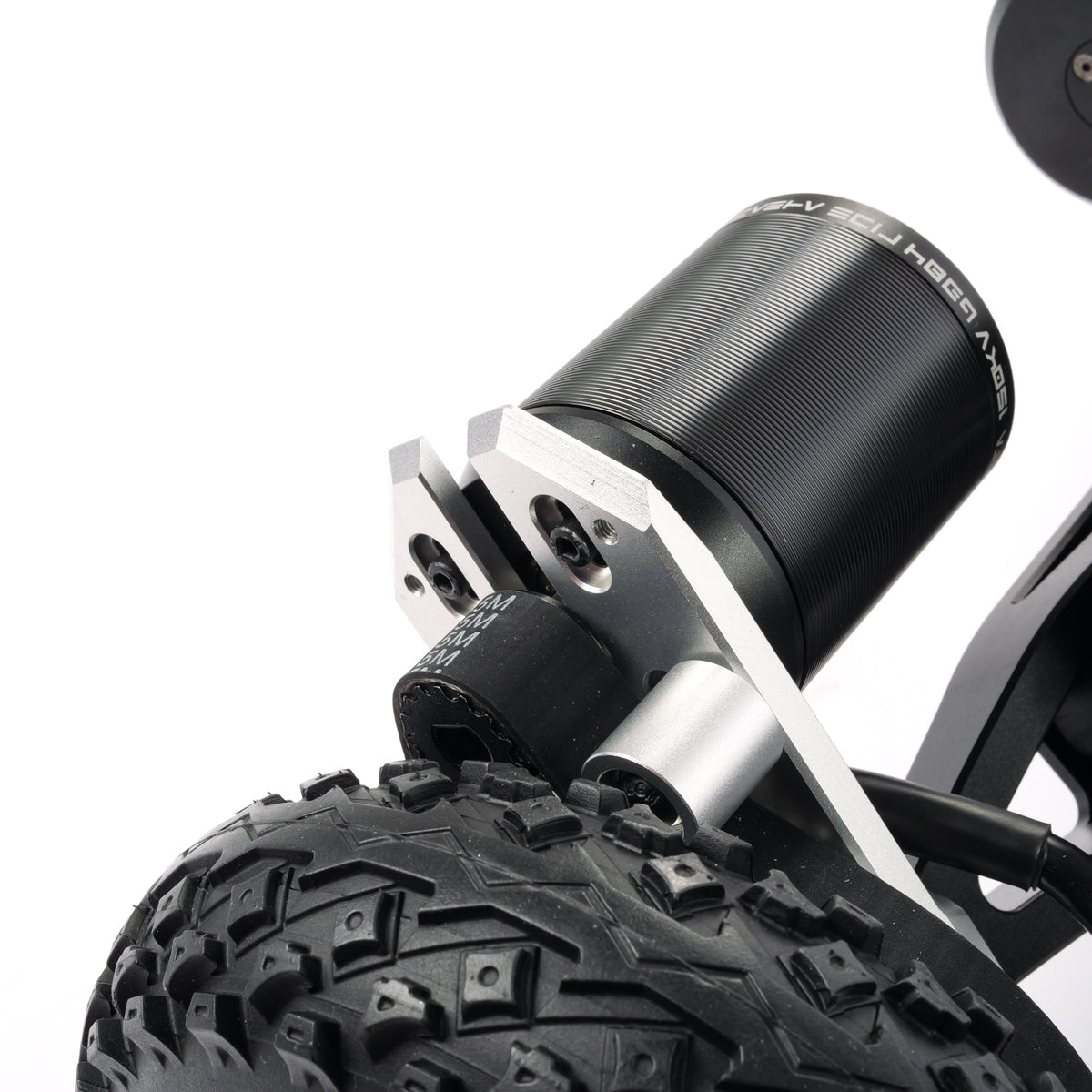 ONSRA belt drive motor and knobby all-terrain tire, close-up