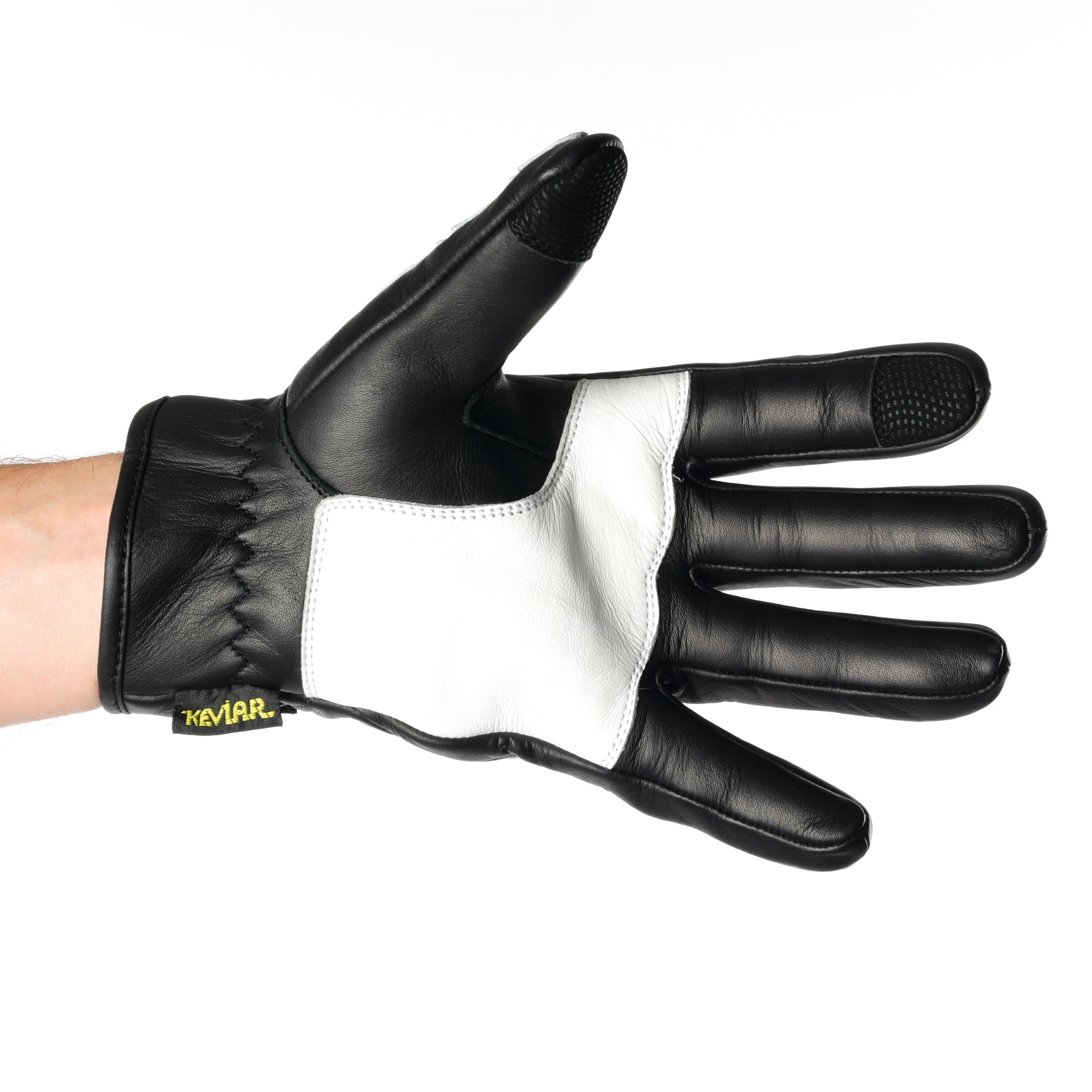 ONSRA BONES KEVLAR motorcycle gloves with white skeleton design and Kevlar reinforcement worn by a rider in a black shirt.