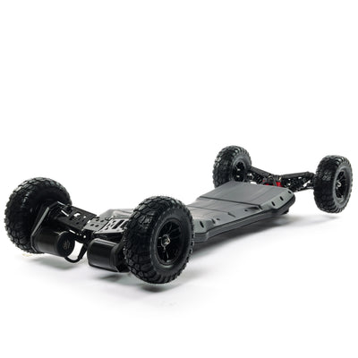 VELAR off-road electric longboard with full suspension, CNC-machined suspension trucks, and large all-terrain tires for a smooth and controlled ride over rough terrain.