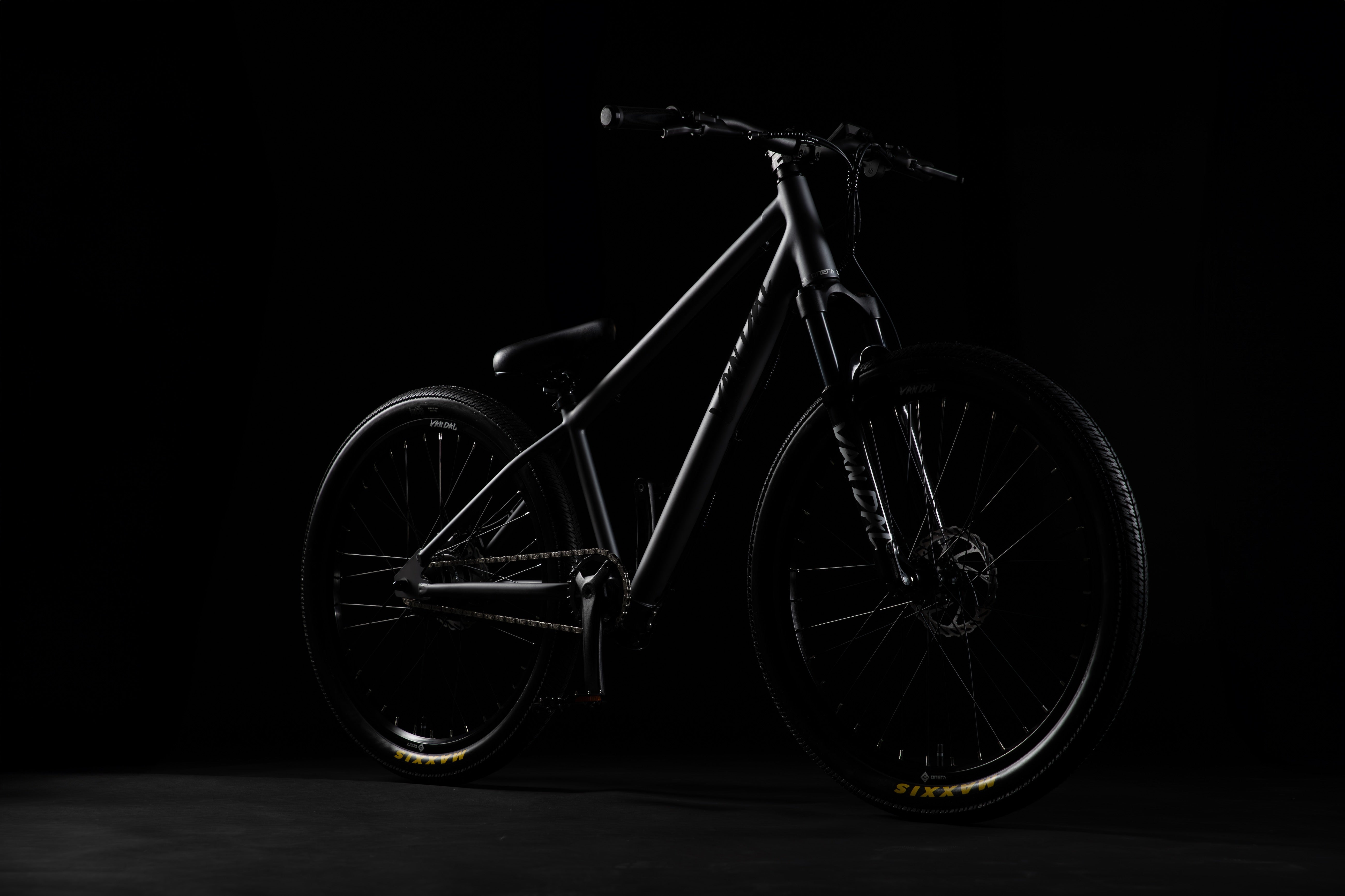 VANDAL electric bike with lightweight chromoly frame, hidden battery, and optional extended range battery for city and off-road riding.