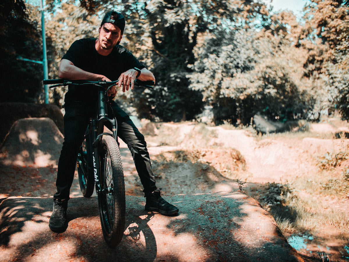 Rider with an ONSRA VANDAL electric bike outdoors